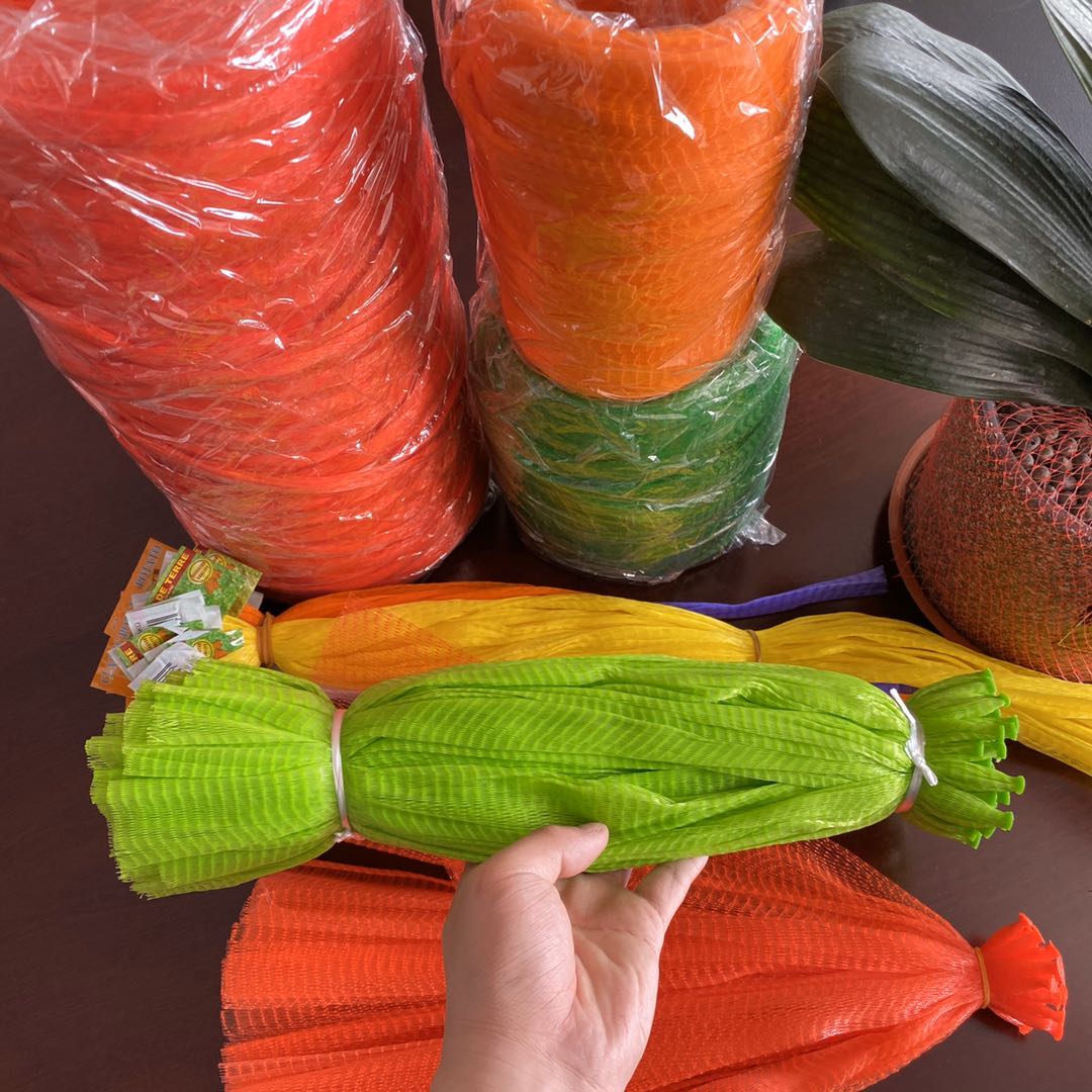 Petit pain de sacs en plastique de filet de pomme de fruit